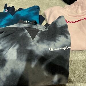 Bundle of 3 women’s large Champion hoodies.